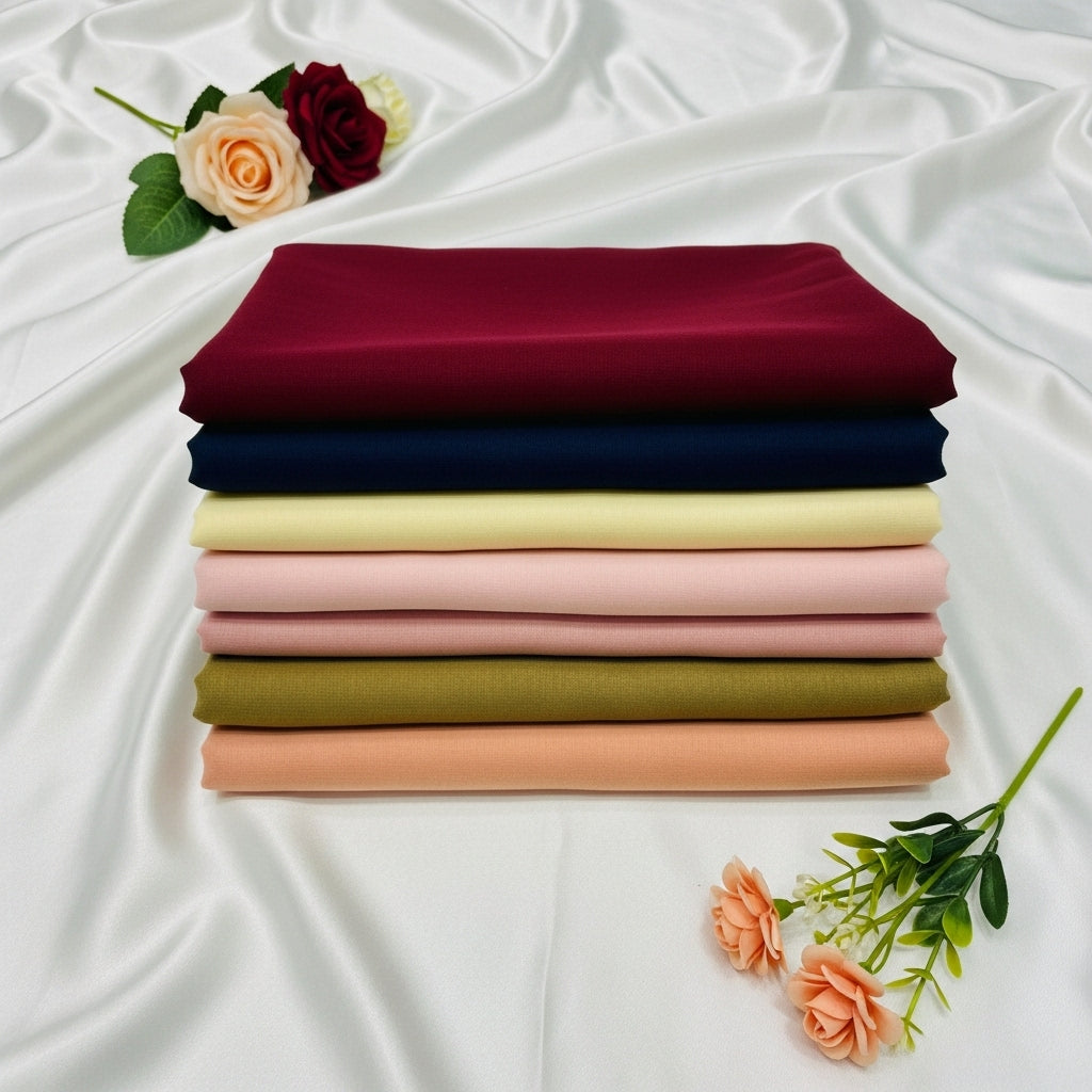 packed (folded) turbans are styled on silk cloth and there are some flowers styled on silk cloth