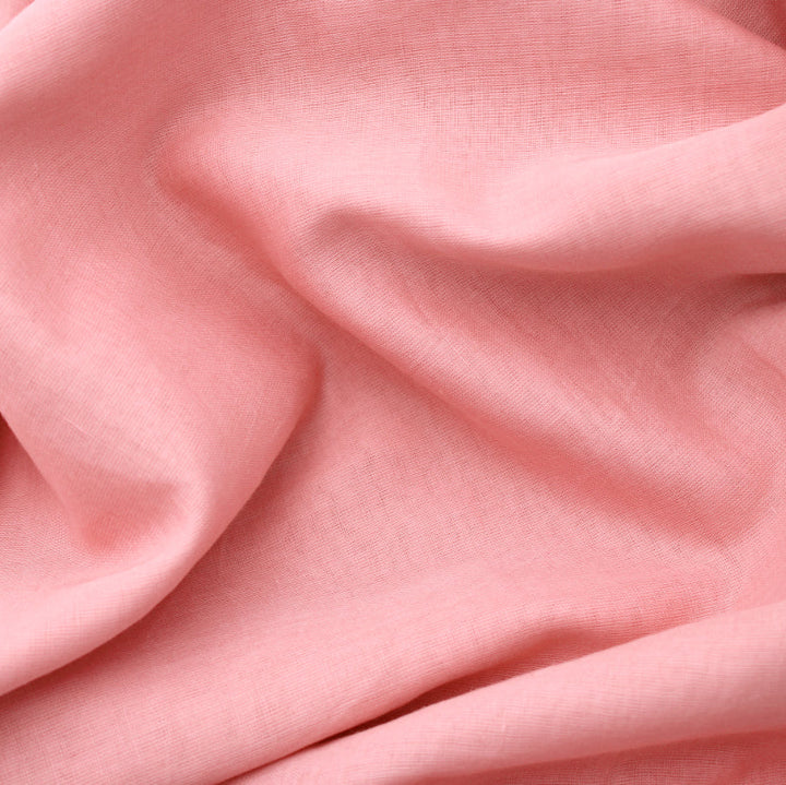 Close-up of pink fabric with folds