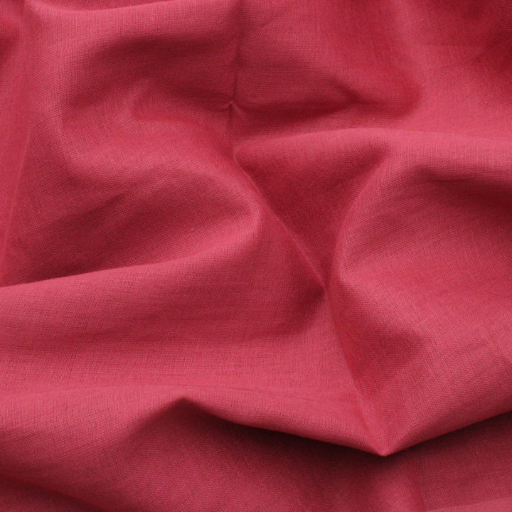 Close-up of pink fabric with folds