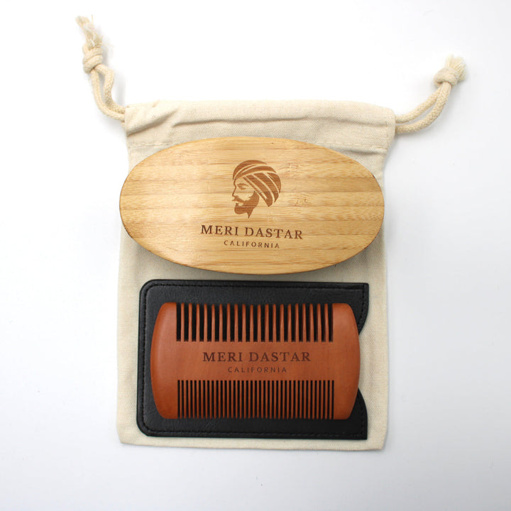 Beard comb and wooden brush set with Meri Dastar branding on a white background